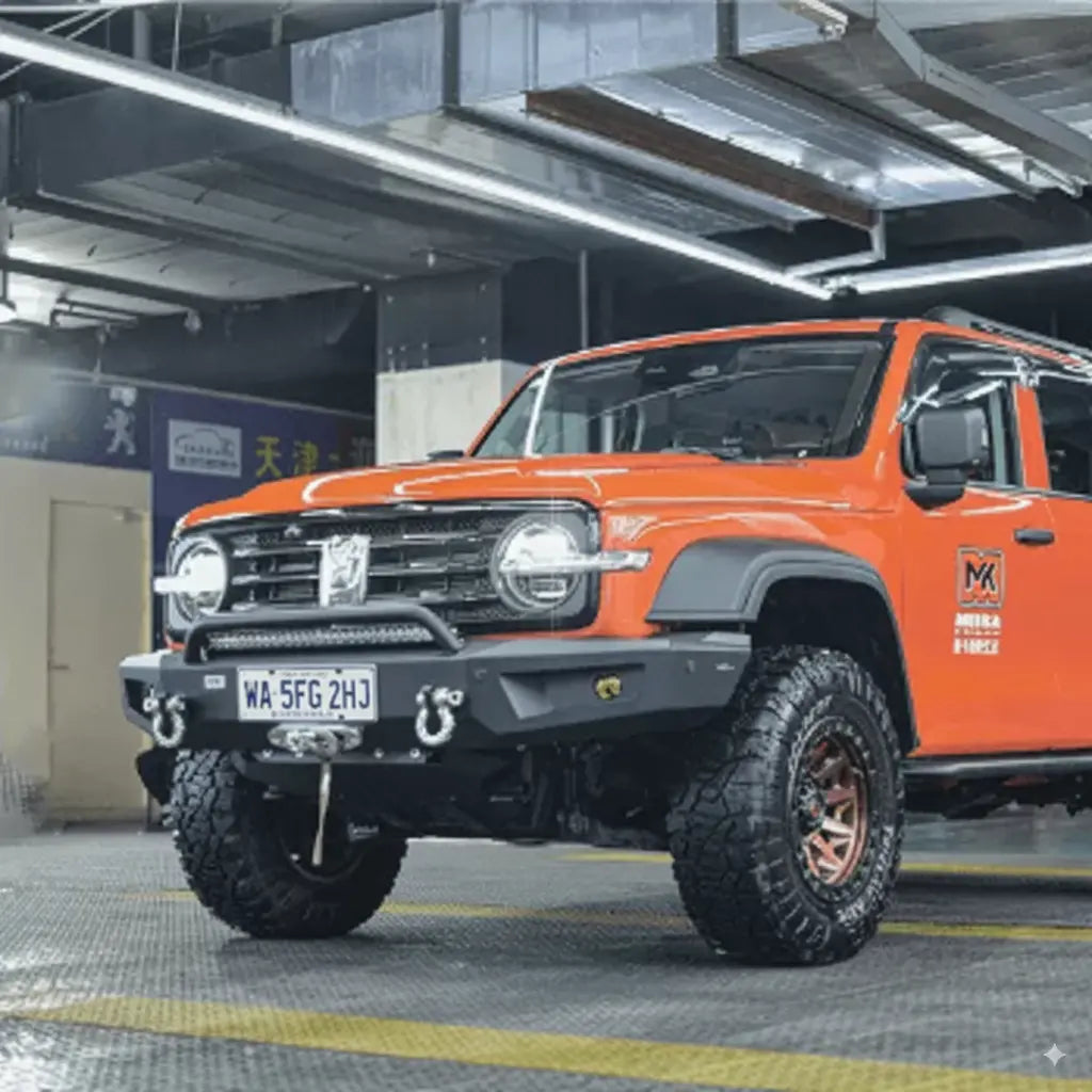 Close-up of MEIKA Conqueror front bumper on GWM Tank 300 HEV/Hybrid highlighting winch mount and powder-coated finish